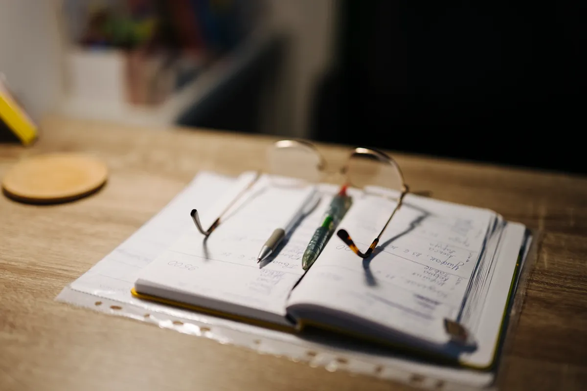 Todoist vs TickTick 2026 — productivity planner desk